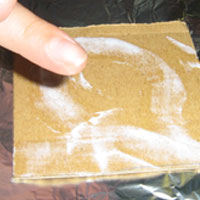 glue cardboard on matchbox